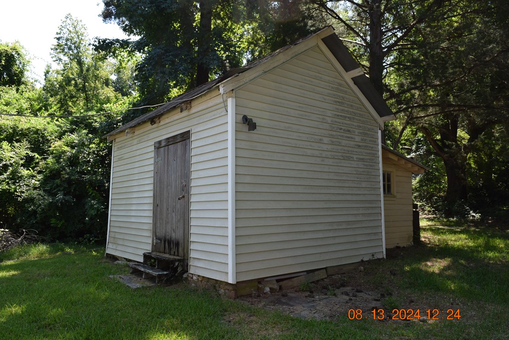 511 Chafin Drive Manchester, GA 31816 - Photo 15 of 16 a view of a house with a yard