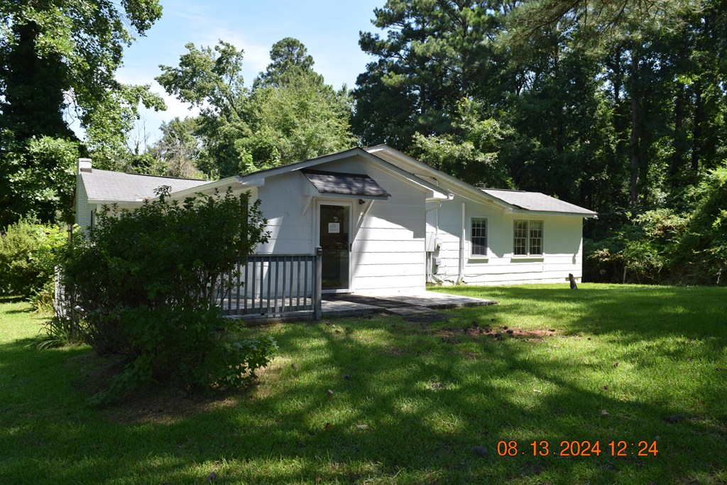 511 Chafin Drive Manchester, GA 31816 - Photo 16 of 16 a front view of a house with a garden