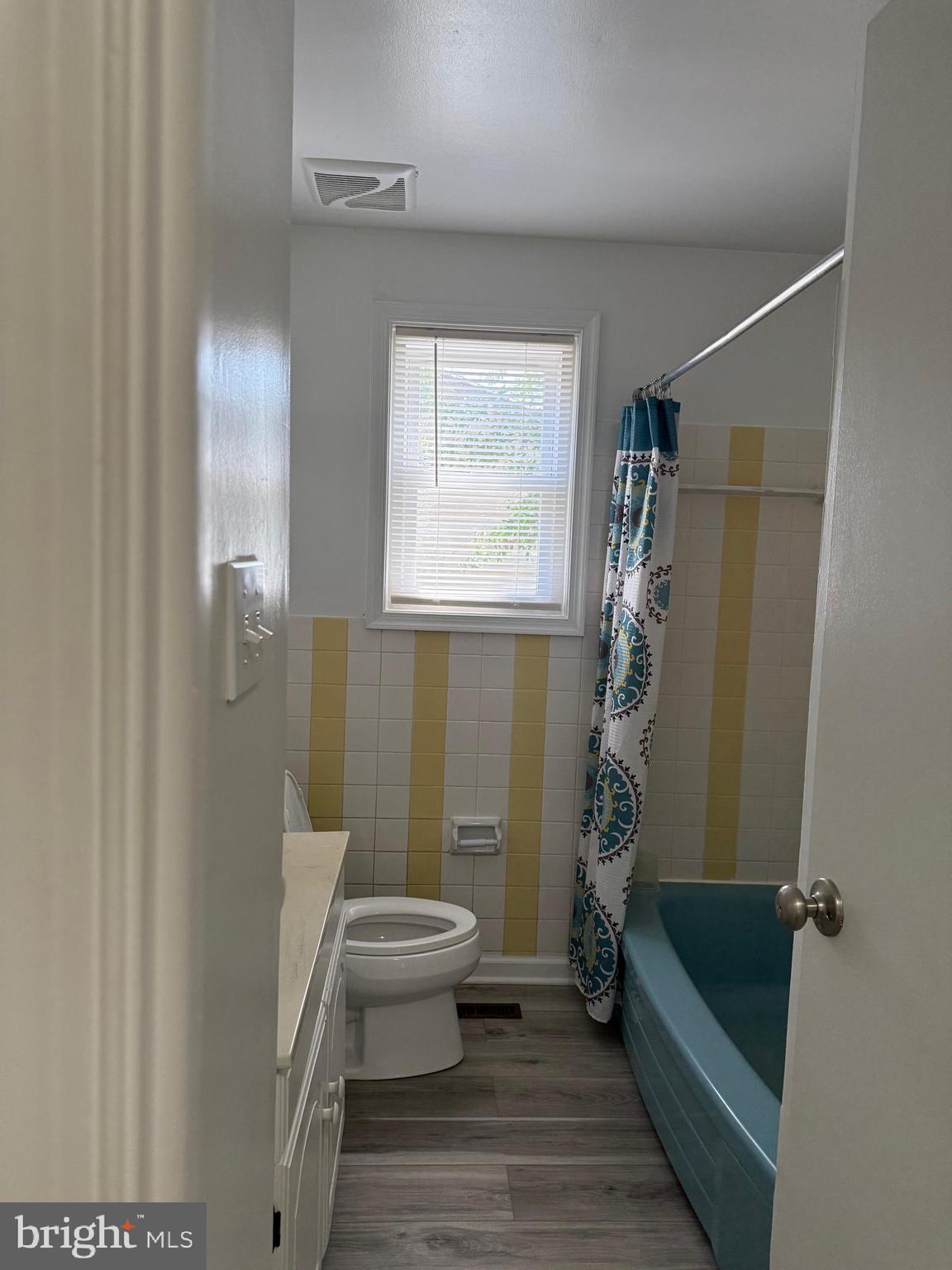 229 Old Line Avenue Laurel, MD 20724 - Photo 17 of 42 a bathroom with a tub a sink and a shower