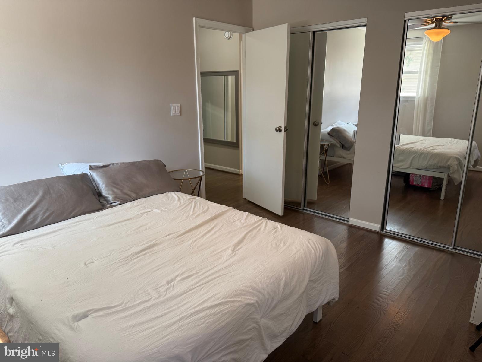 229 Old Line Avenue Laurel, MD 20724 - Photo 19 of 42 a bedroom with a bed and a walk in closet