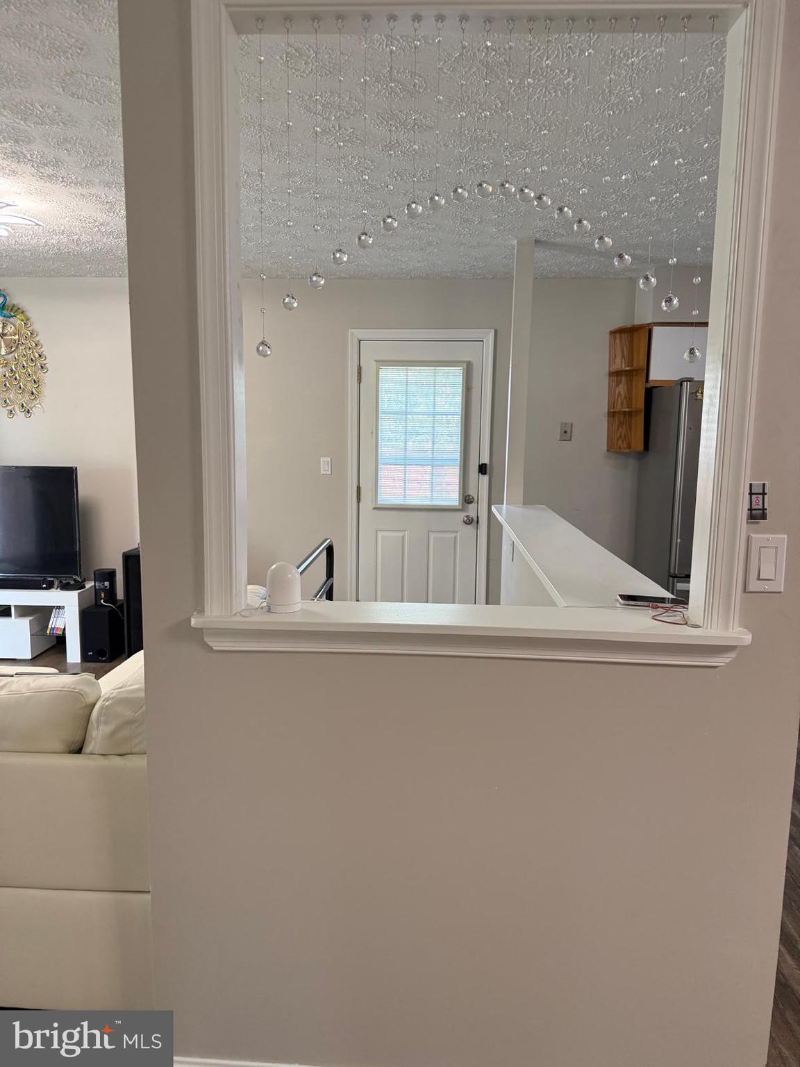 229 Old Line Avenue Laurel, MD 20724 - Photo 21 of 42 a living room with furniture and a flat screen tv