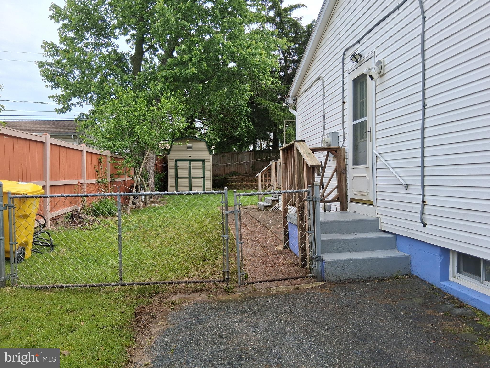 229 Old Line Avenue Laurel, MD 20724 - Photo 33 of 42 a view of a house with backyard and a tree