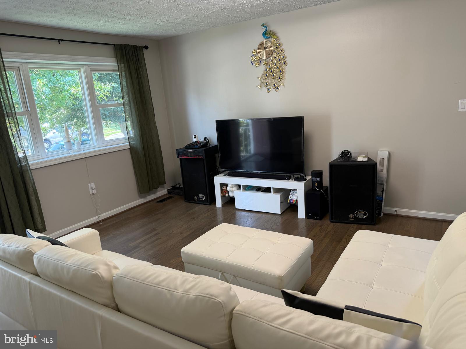229 Old Line Avenue Laurel, MD 20724 - Photo 4 of 42 a living room with furniture and a flat screen tv