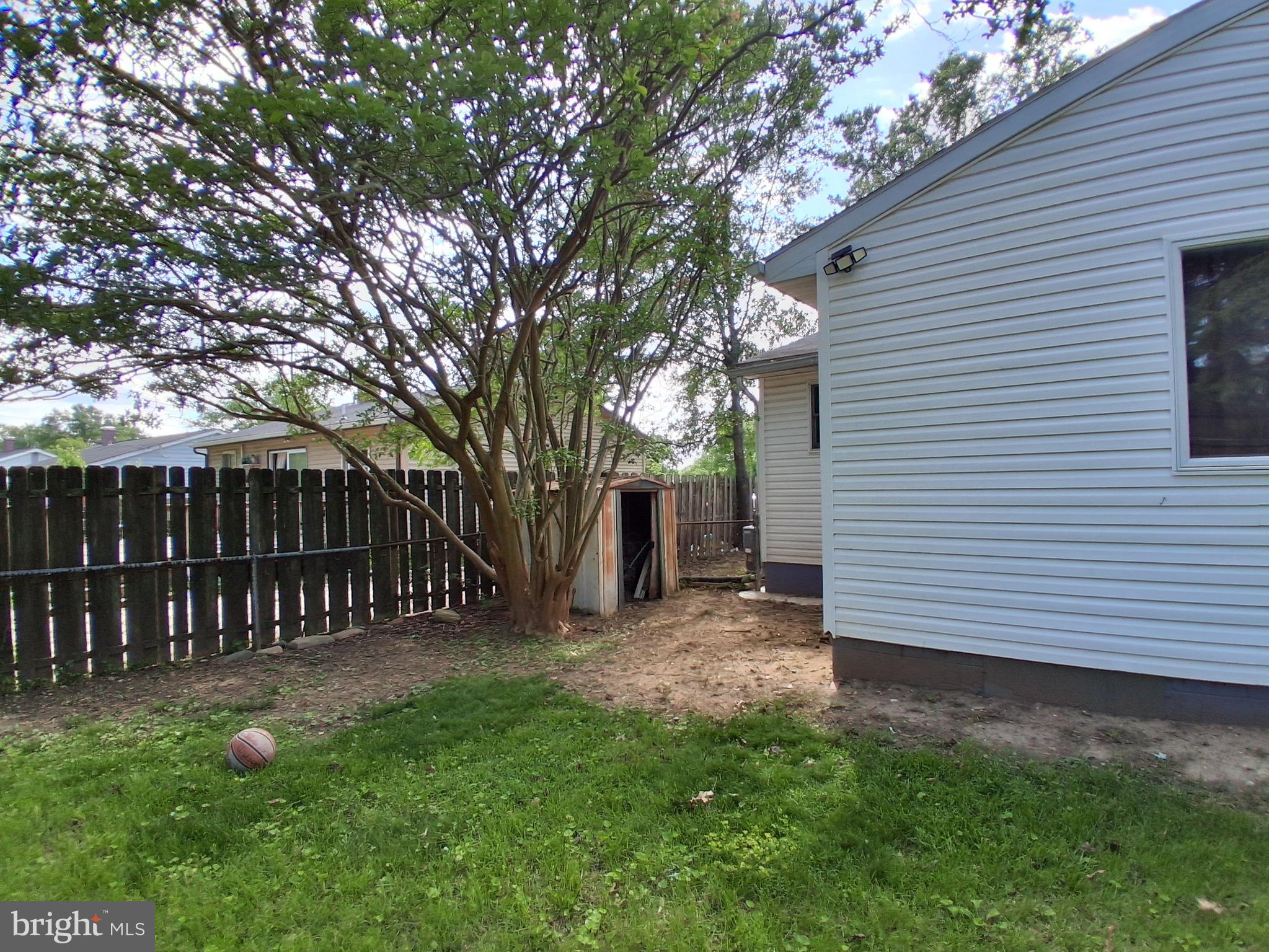 229 Old Line Avenue Laurel, MD 20724 - Photo 42 of 42 a view of a backyard with a large tree
