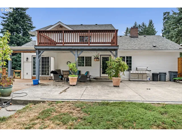 a view of a house with sitting area and furniture