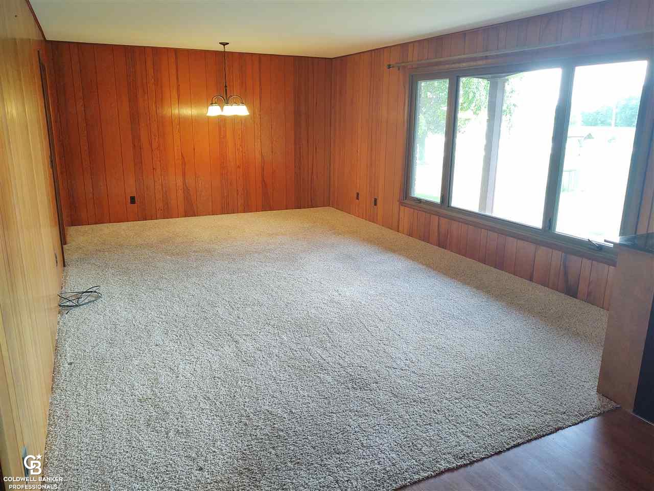 9894 Yale Road Avoca, MI 48006 - Photo 6 of 27 This is a view of the living room.
