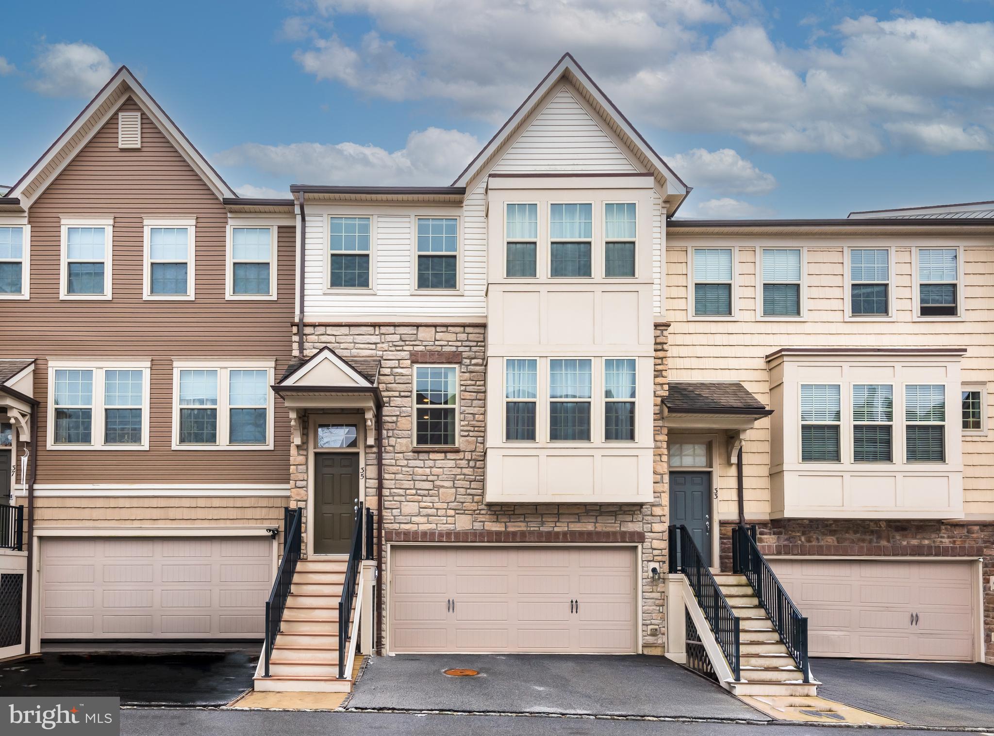 front view of a house with a street