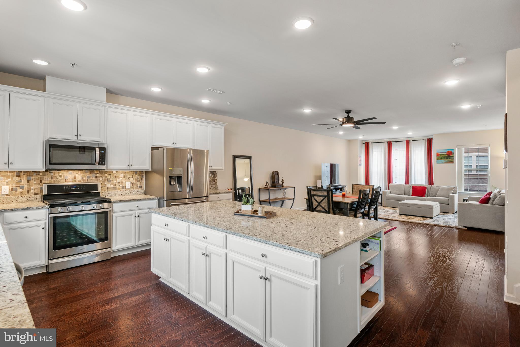 35 Addison Lane Malvern, PA 19355 - Photo 14 of 42 a kitchen with sink stove and cabinets