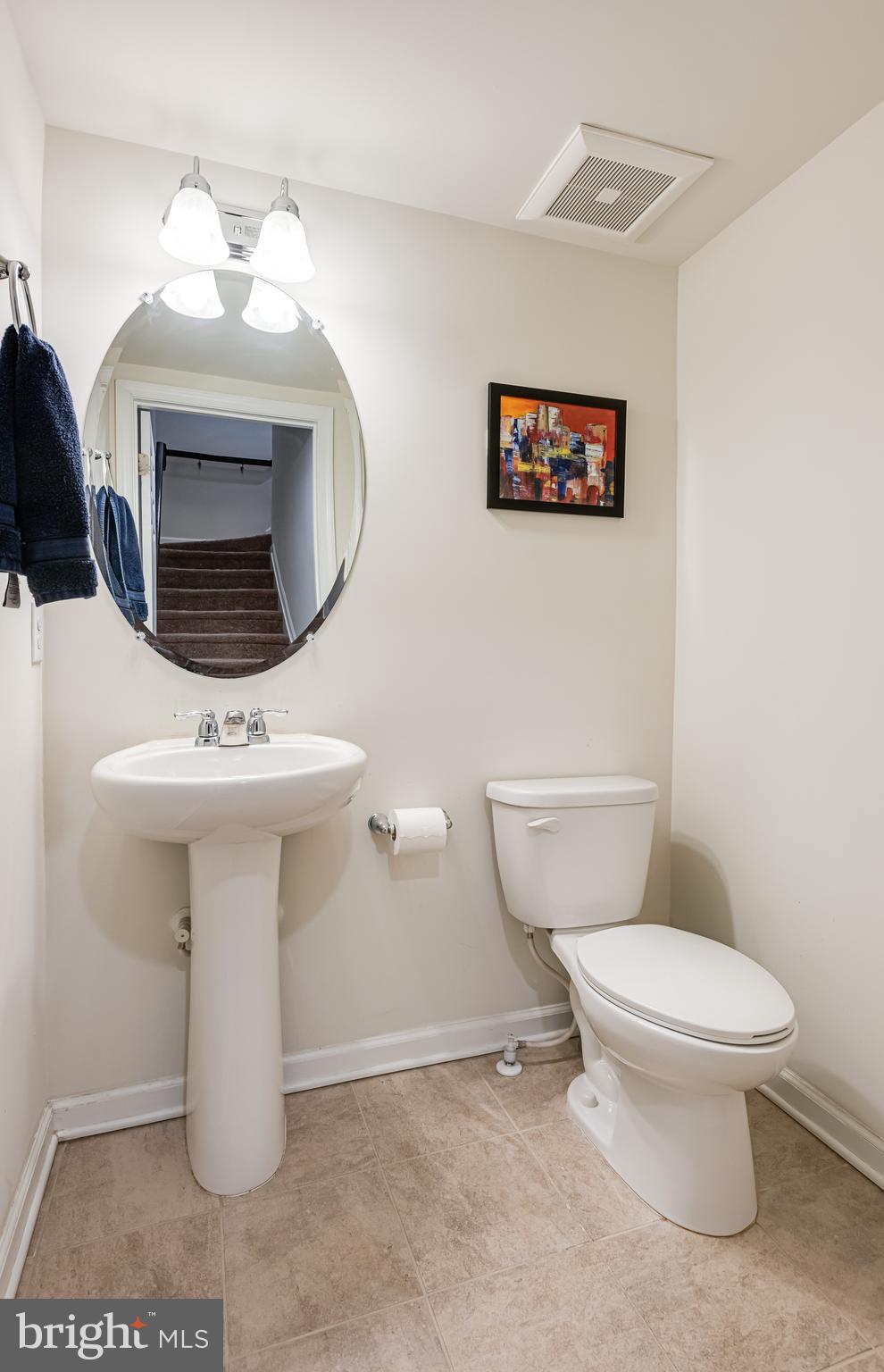 35 Addison Lane Malvern, PA 19355 - Photo 16 of 42 a bathroom with a toilet sink and mirror