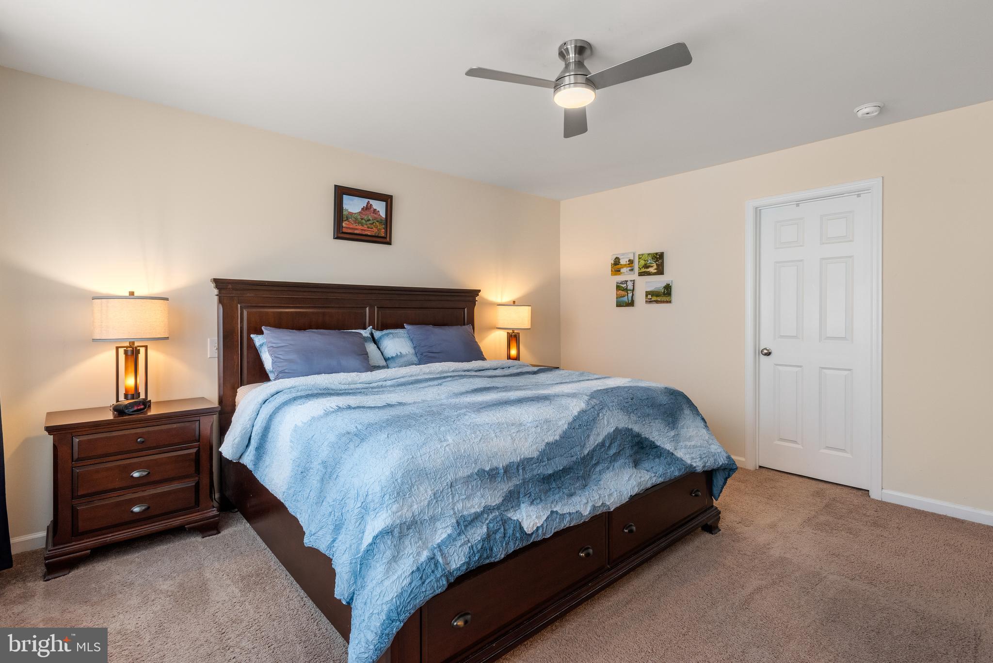 35 Addison Lane Malvern, PA 19355 - Photo 19 of 42 a bedroom with a bed and a lamp