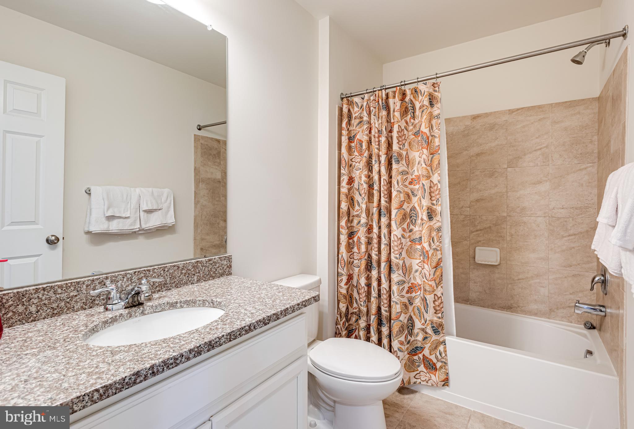 35 Addison Lane Malvern, PA 19355 - Photo 25 of 42 a bathroom with a granite countertop sink toilet and shower