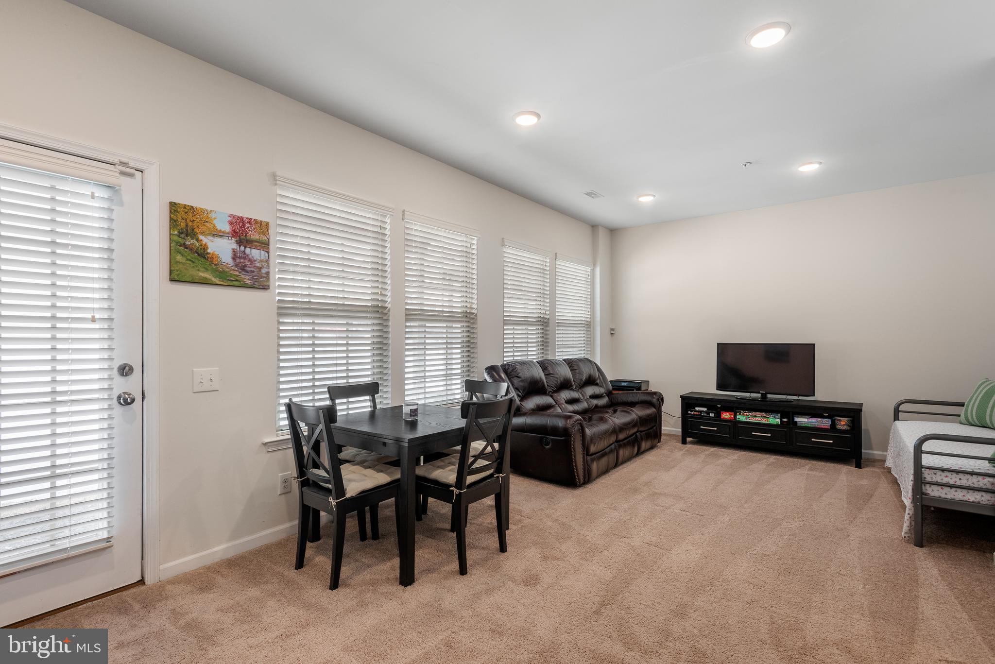 35 Addison Lane Malvern, PA 19355 - Photo 30 of 42 a living room with furniture and a flat screen tv