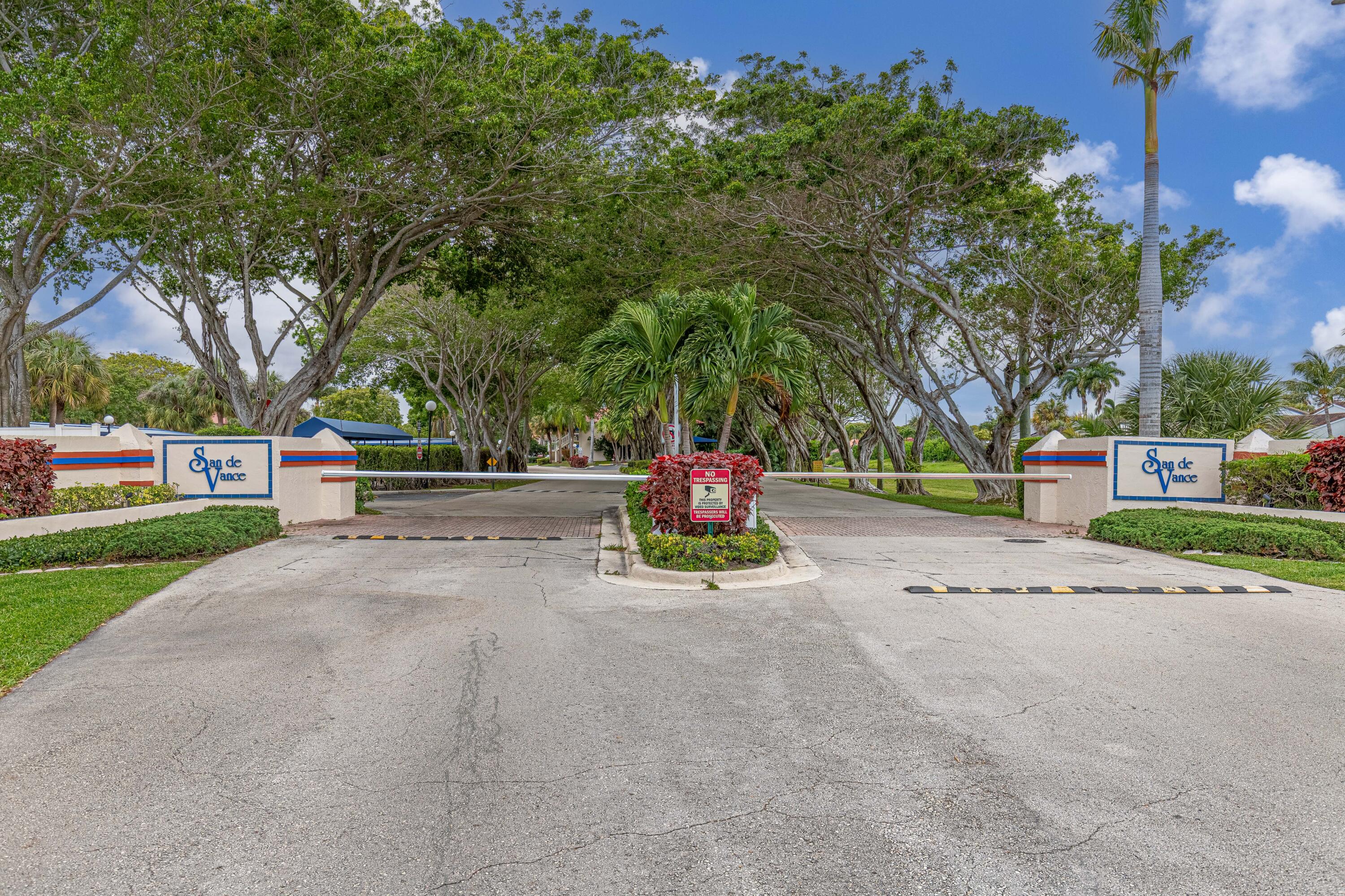 260 Northwest 67th Street, Unit A203 Boca Raton, FL 33487 - Photo 16 of 25 Community Entrance