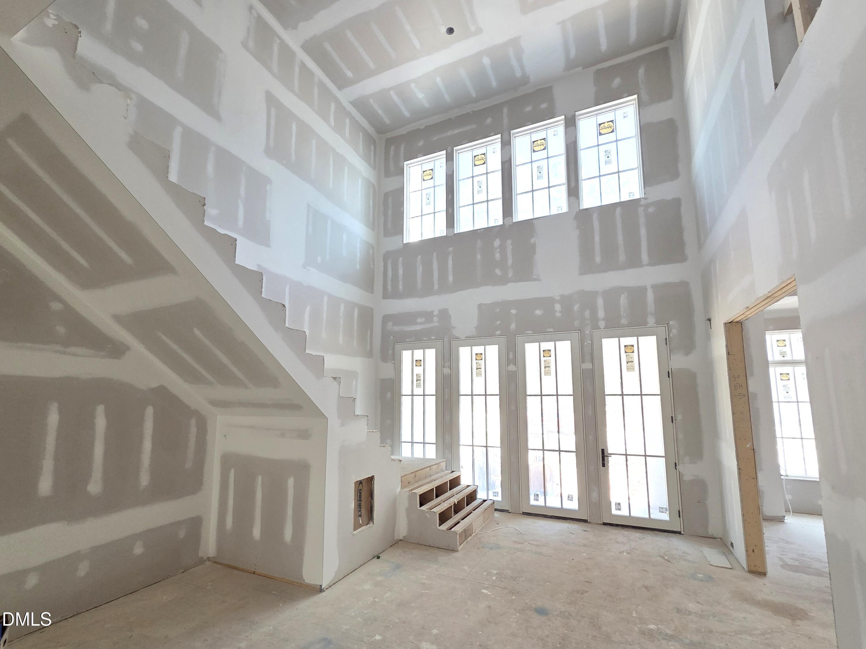 6477 Sanctuary Falls Drive Raleigh, NC 27614 - Photo 24 of 49 a view of an entryway with an empty room