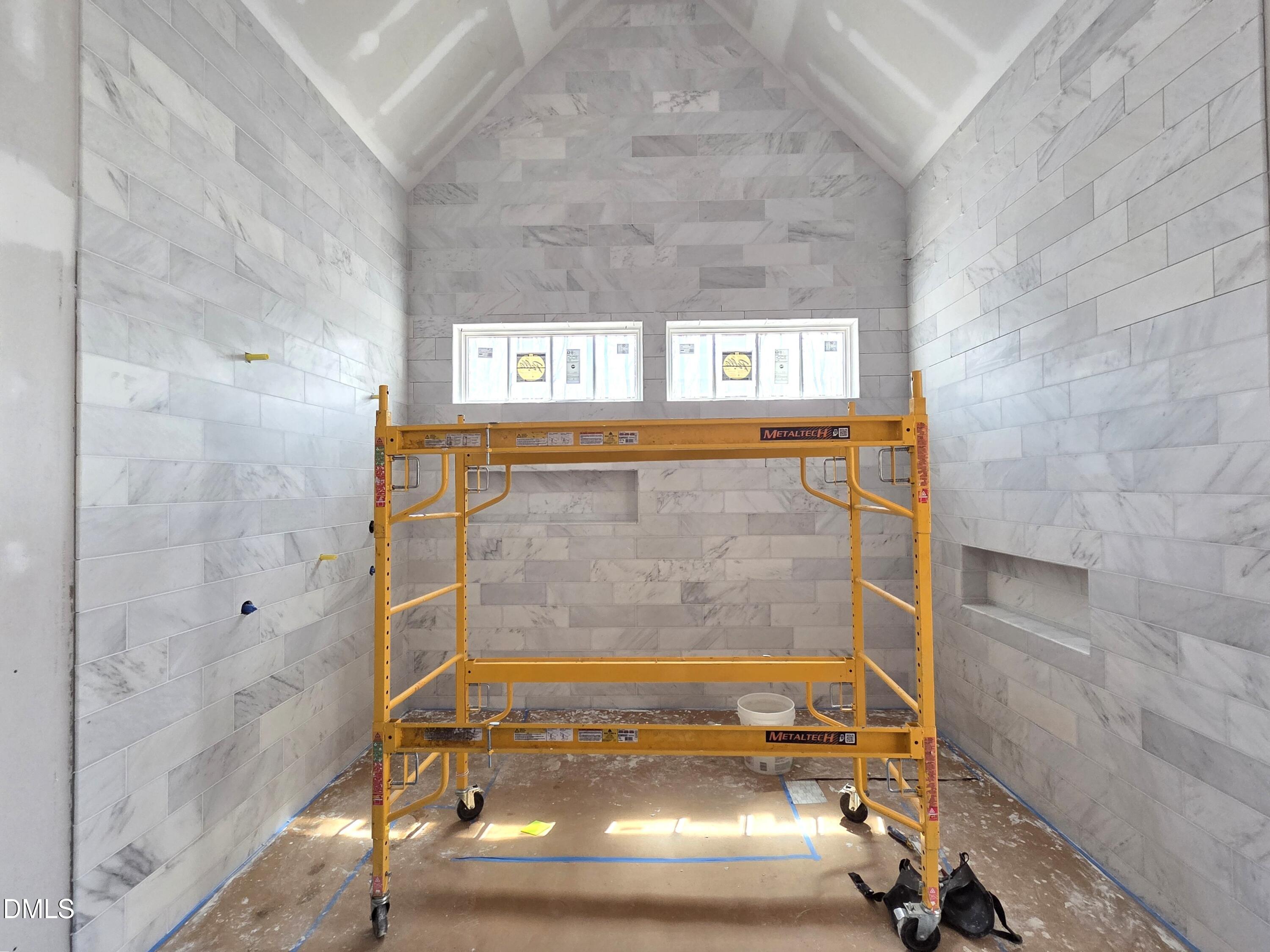 6477 Sanctuary Falls Drive Raleigh, NC 27614 - Photo 29 of 49 a bathroom with a shower