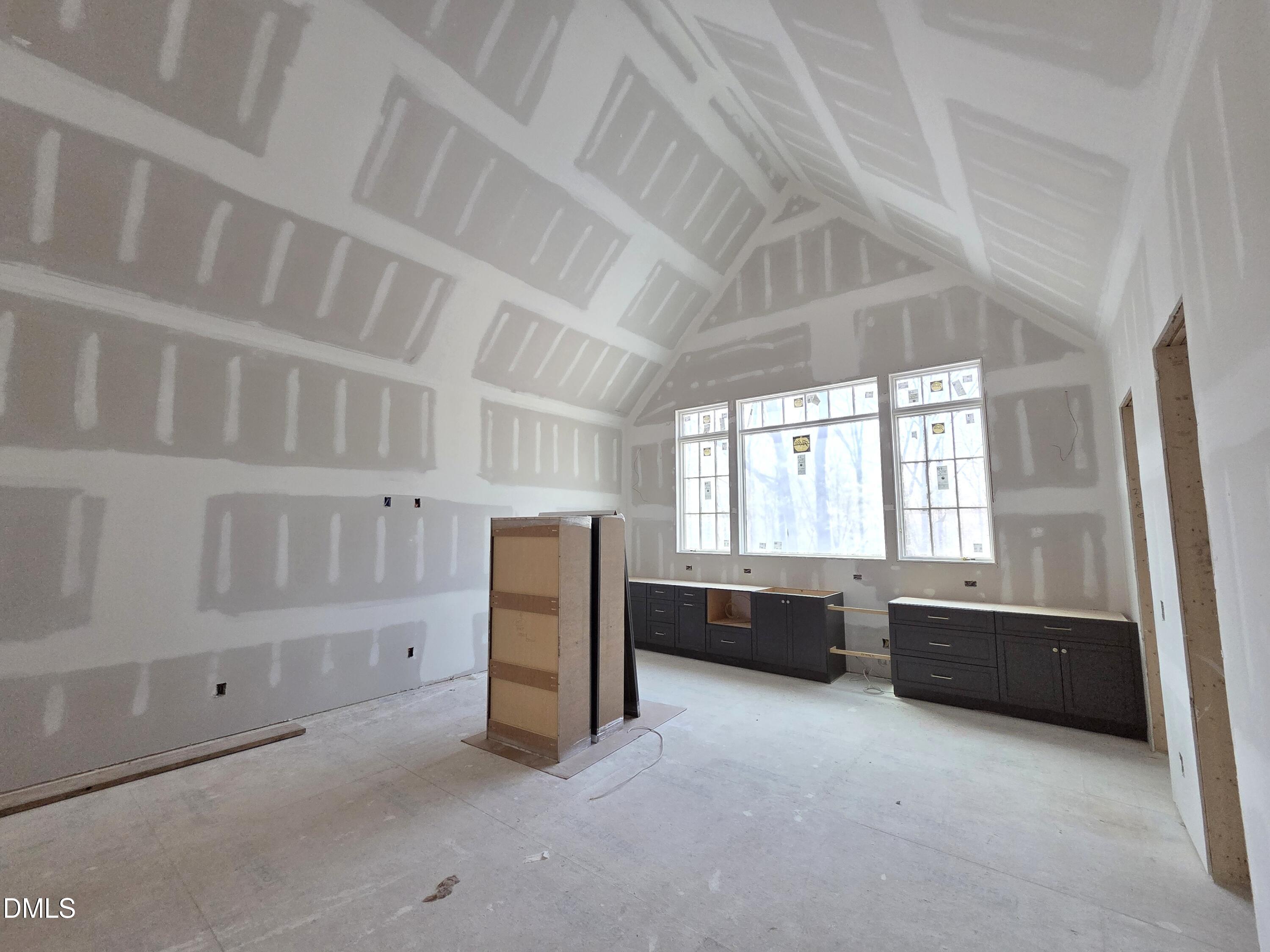 6477 Sanctuary Falls Drive Raleigh, NC 27614 - Photo 31 of 49 a room with furniture and window