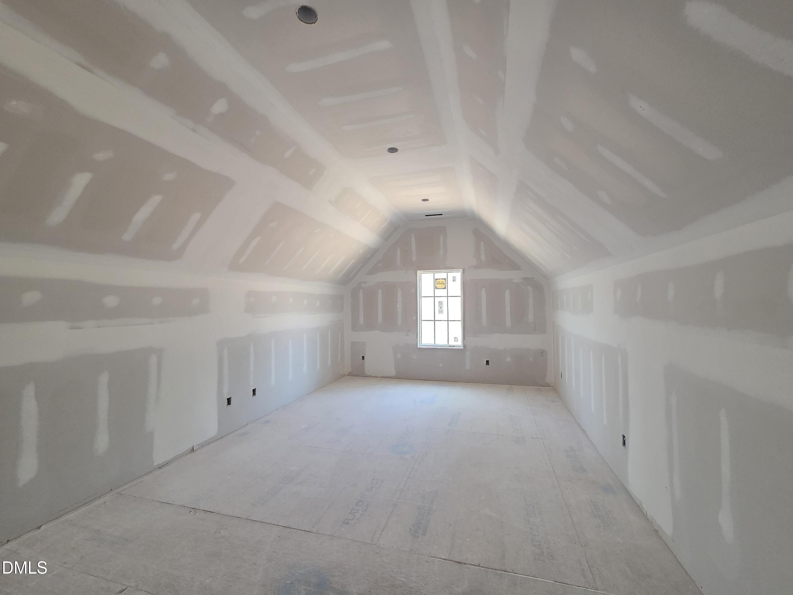 6477 Sanctuary Falls Drive Raleigh, NC 27614 - Photo 43 of 49 a view of a hallway with window