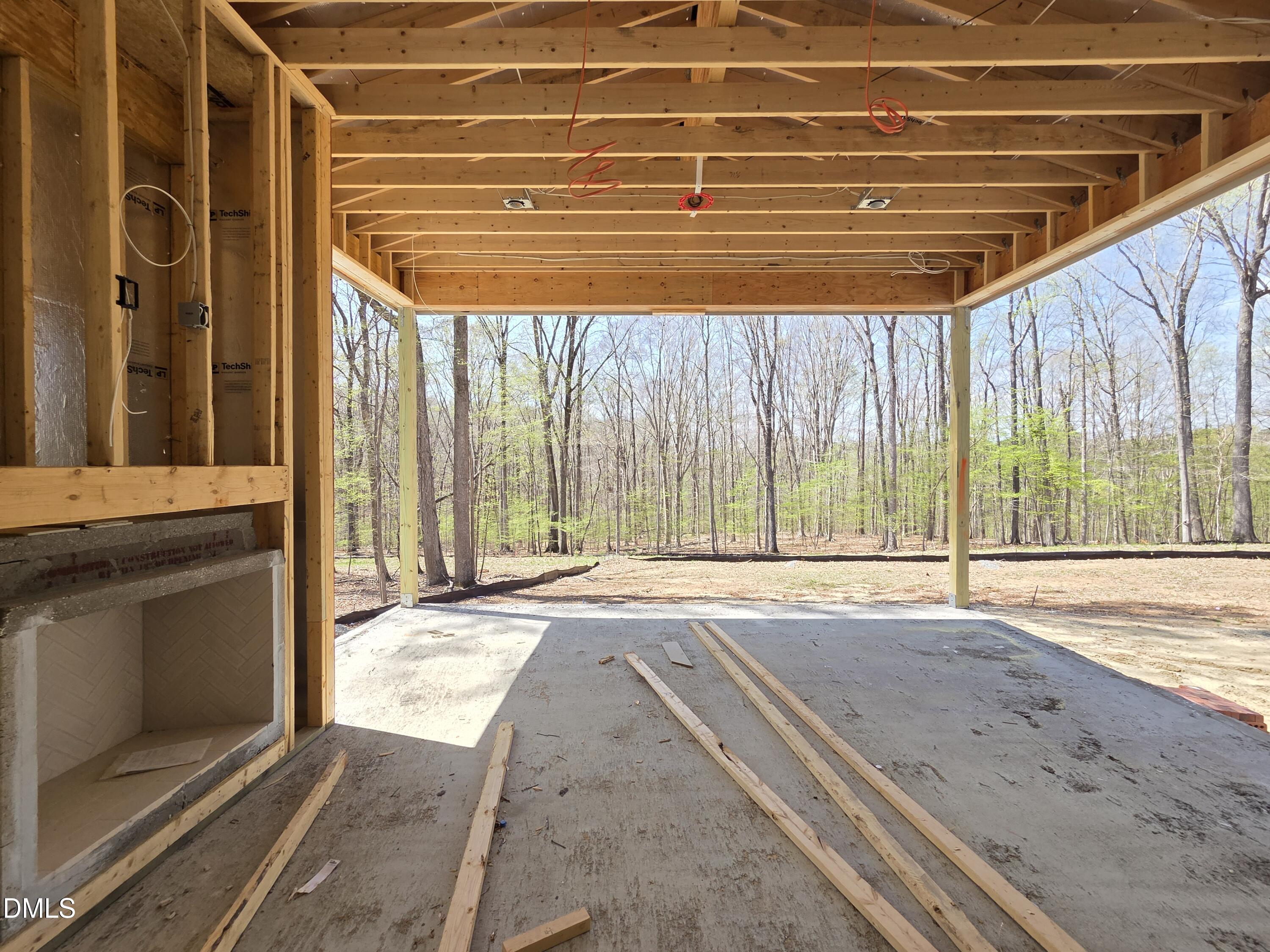 6477 Sanctuary Falls Drive Raleigh, NC 27614 - Photo 45 of 49 a view of a living room and a window