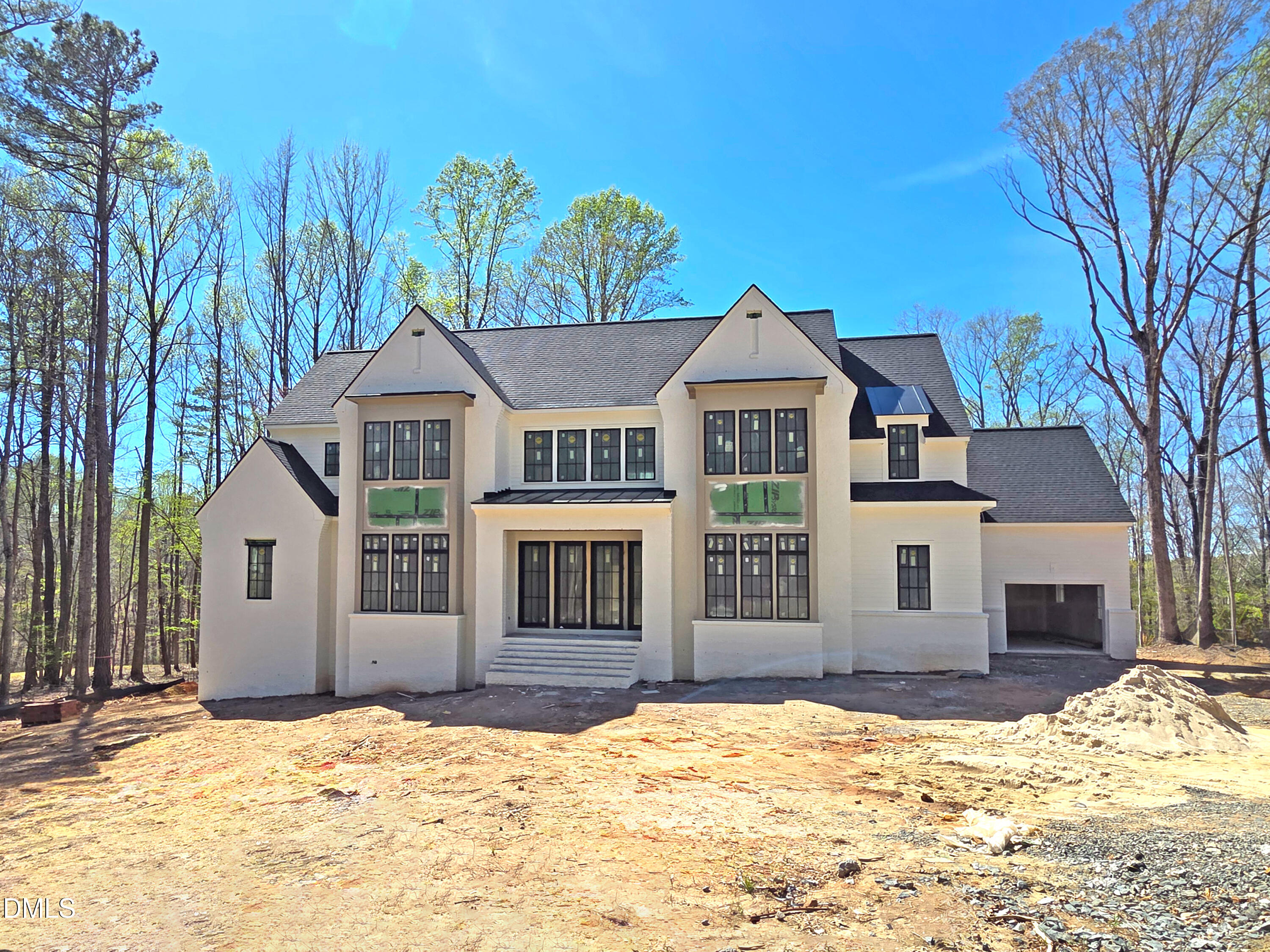 6477 Sanctuary Falls Drive Raleigh, NC 27614 - Photo 3 of 49 a front view of a house with a yard