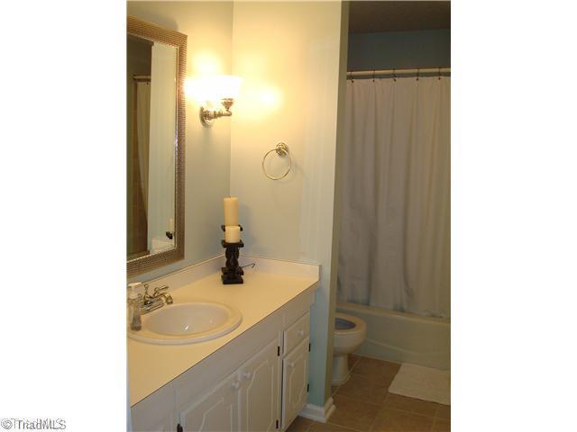 3322 Rockingham Road High Point, NC 27265 - Photo 13 of 13 Other. Updated Hall Bath with updated tile flooring & tile surrounding the tub/shower. Updated fixtures. No wallpaper in this home.