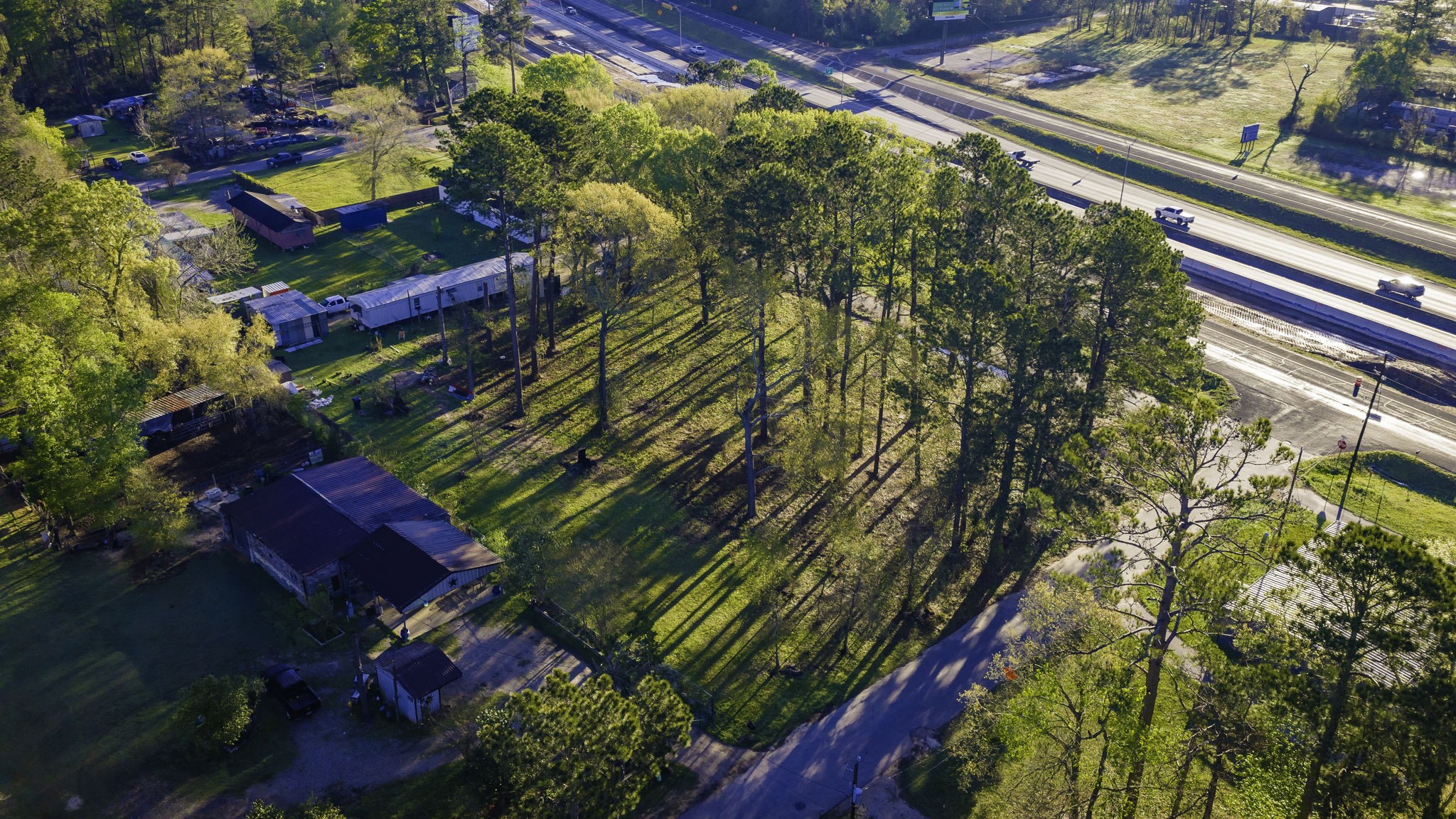 400 Hickory Street Cleveland, TX 77328 - Photo 5 of 10 view of a yard