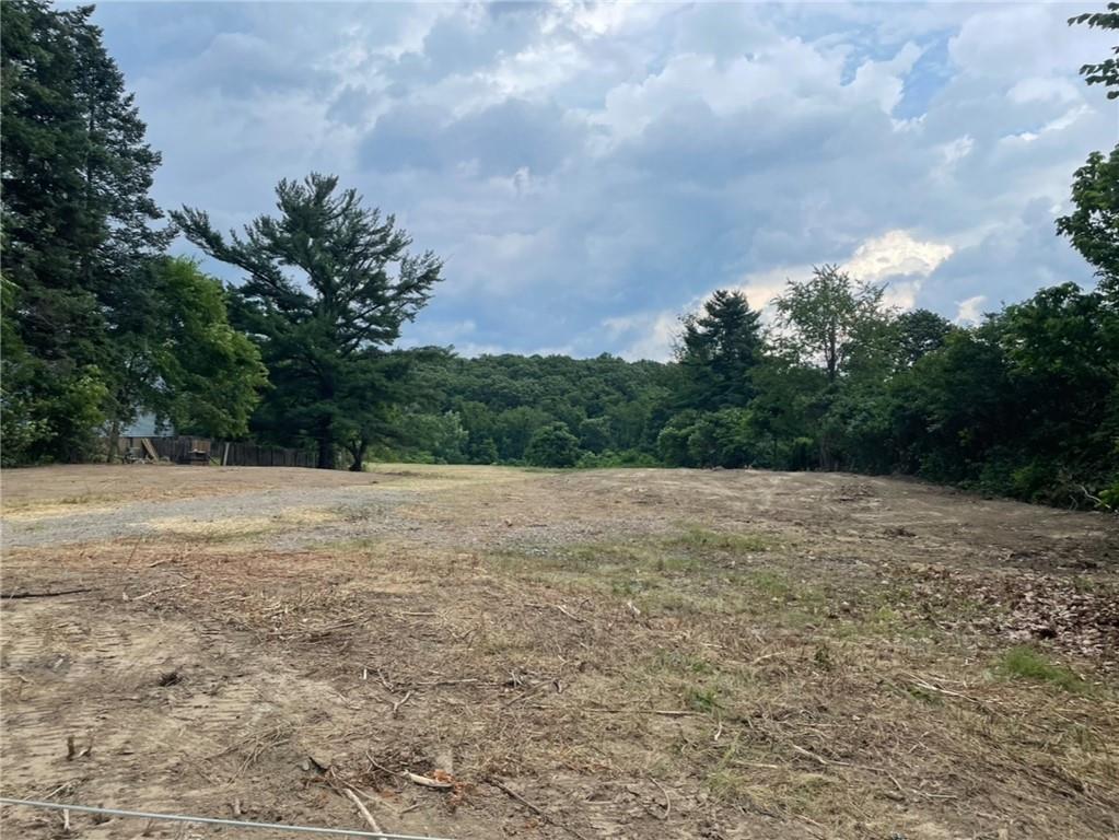 3372 Brodhead Road Aliquippa, PA 15001 - Photo 7 of 17 a view of dirt field with trees in background