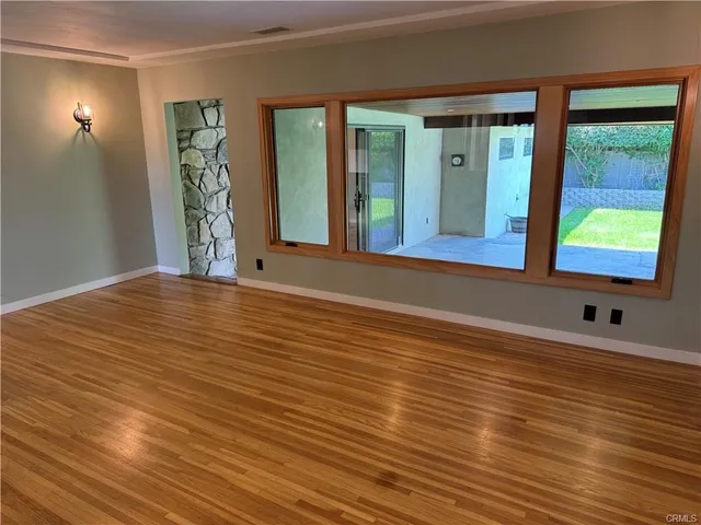 a bathroom with a sink vanity and mirror