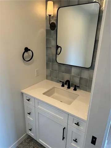 a view of backyard with small cabin