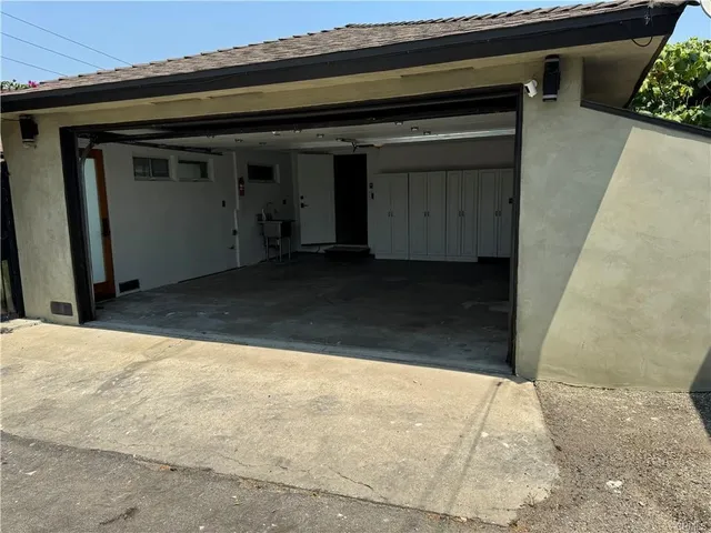 a view of a bathroom from a hallway