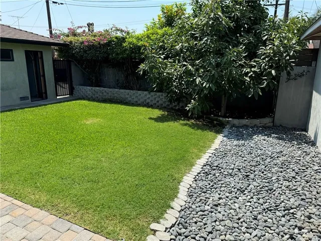 a view of a livingroom with wooden floor