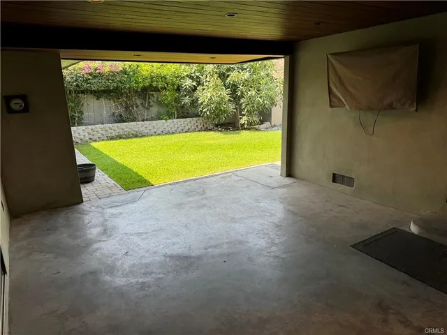 a view of a room that has a window