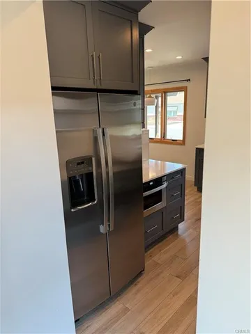 a kitchen with a stove and a microwave