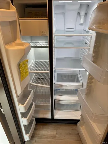 a stove top oven sitting inside of a kitchen