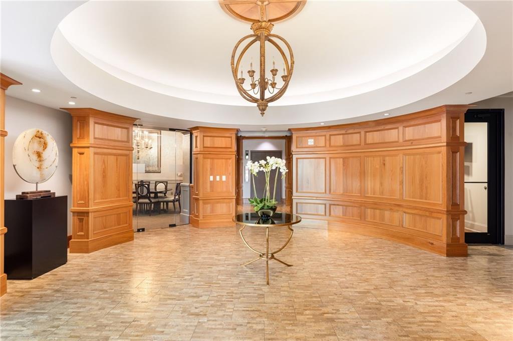 2255 Peachtree Road Northeast, Unit 326 Atlanta, GA 30309 - Photo 29 of 37 a room with lots of table and chair