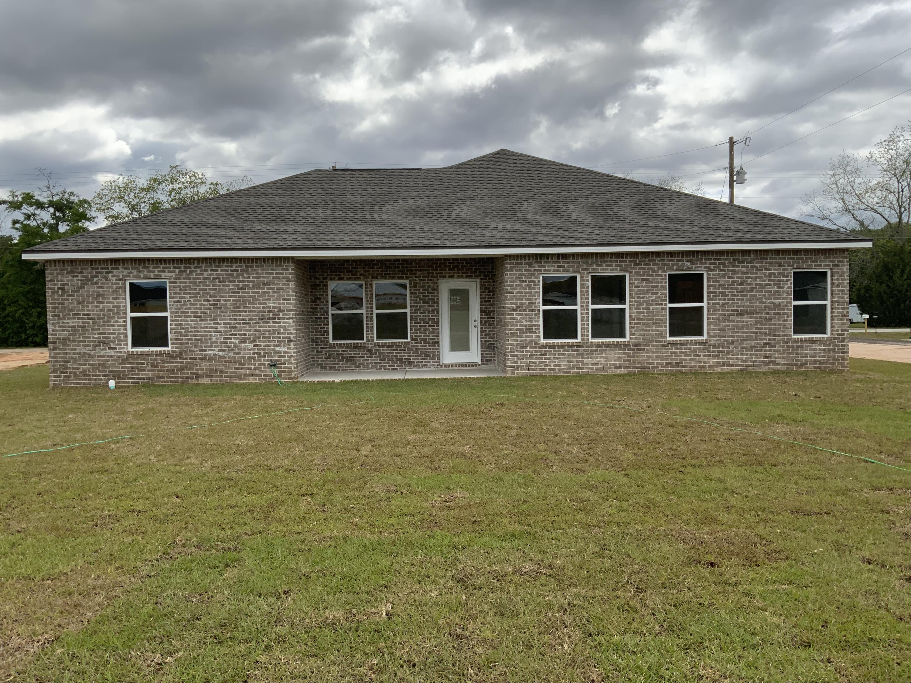 5235 Griffith Mill Road Baker, FL 32531 - Photo 10 of 10 a front view of a house with yard