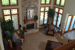 12558 Bellingham Road Caledonia, IL 61011 - Photo 5 of 6 a living room with furniture and a fireplace