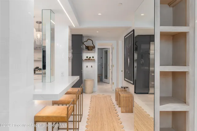 a large bathroom with a glass door shower