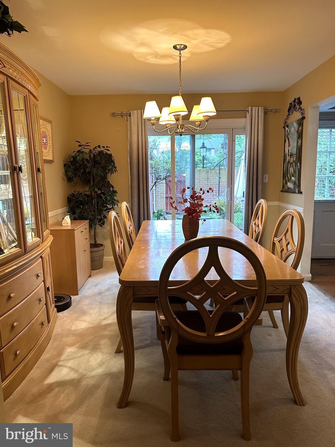 8244 Carrleigh Parkway Springfield, VA 22152 - Photo 10 of 25 a view of a dining room with furniture window and outside view