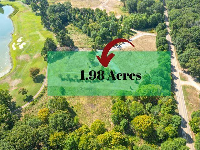 Lot 5 Collierville-arlington Road Collierville, TN 38017 - Photo 2 of 10 a sign that is sitting on a park