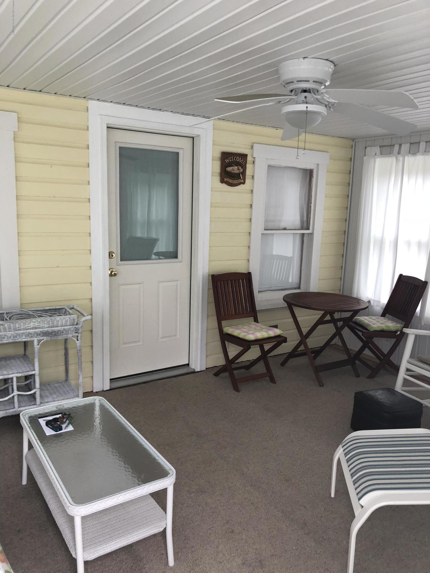 117 Chestnut Street Philadelphia, PA 19106 - Photo 14 of 19 a living room with furniture a window and a table
