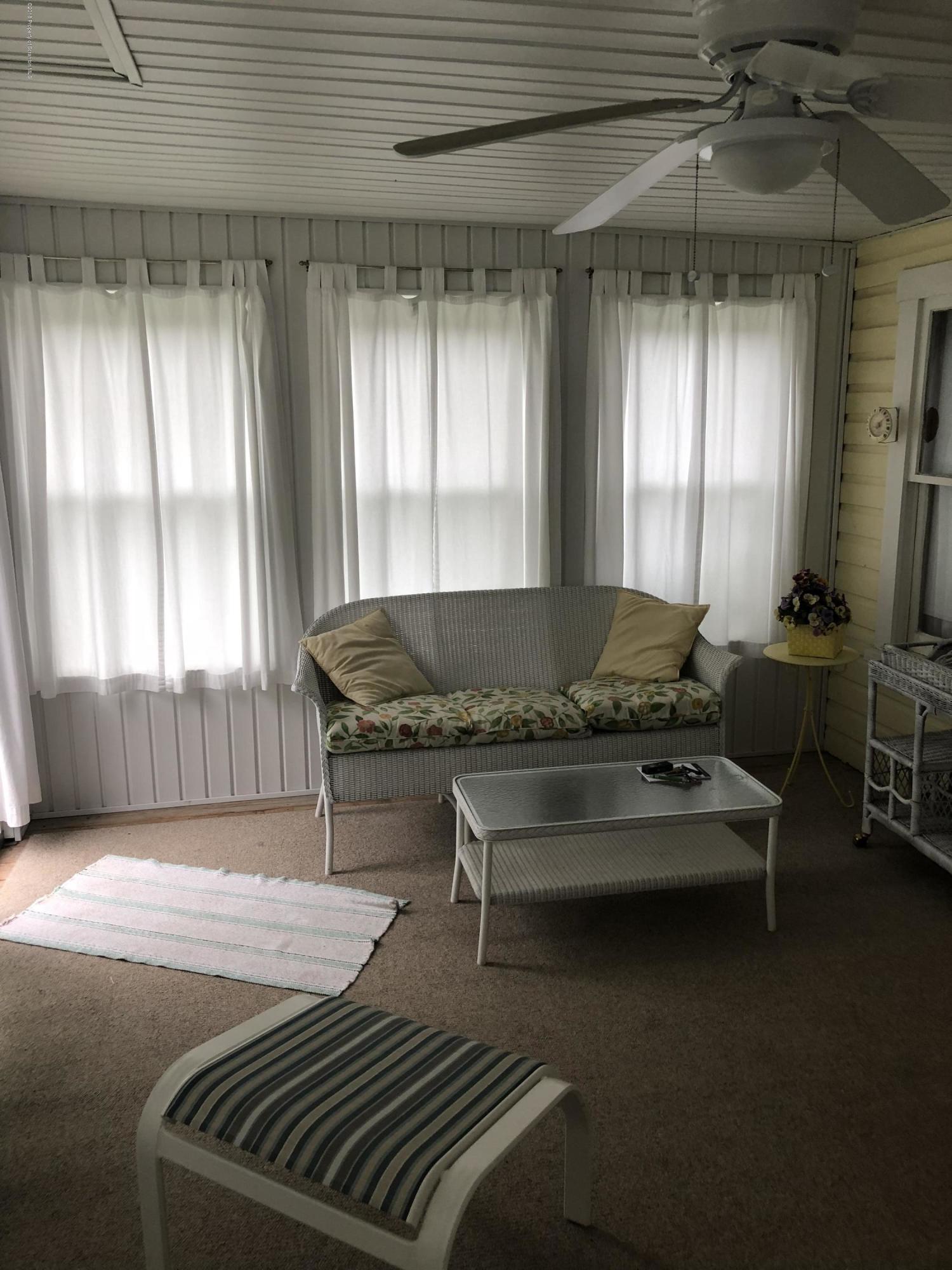 117 Chestnut Street Philadelphia, PA 19106 - Photo 16 of 19 a living room with furniture and a potted plant