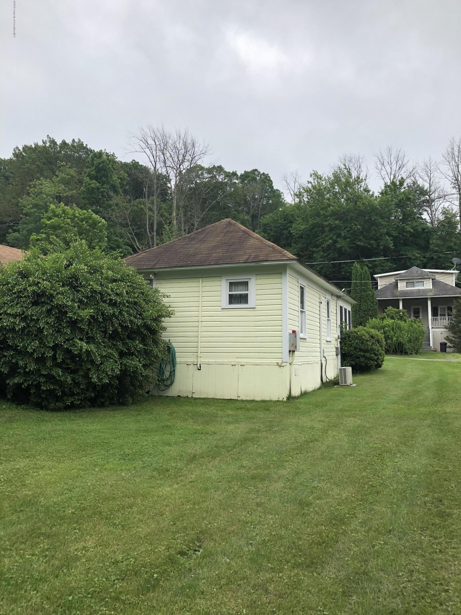 117 Chestnut Street Philadelphia, PA 19106 - Photo 19 of 19 a view of a backyard with potted plants and large trees