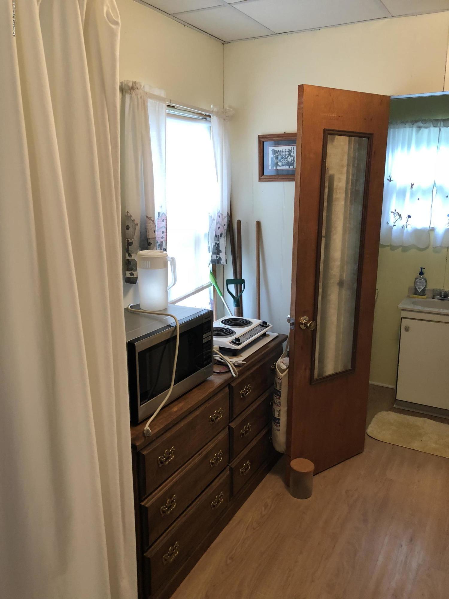 117 Chestnut Street Philadelphia, PA 19106 - Photo 6 of 19 a view of room with window and wooden floor