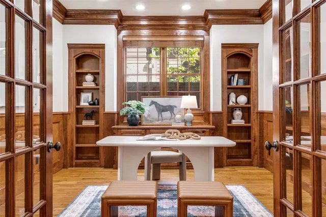 a view of a dining room with furniture and window