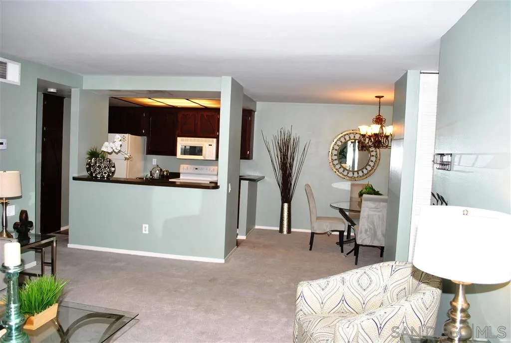 5999 Rancho Mission Road San Diego, CA 92108 - Photo 3 of 25 a view of a livingroom with furniture and windows