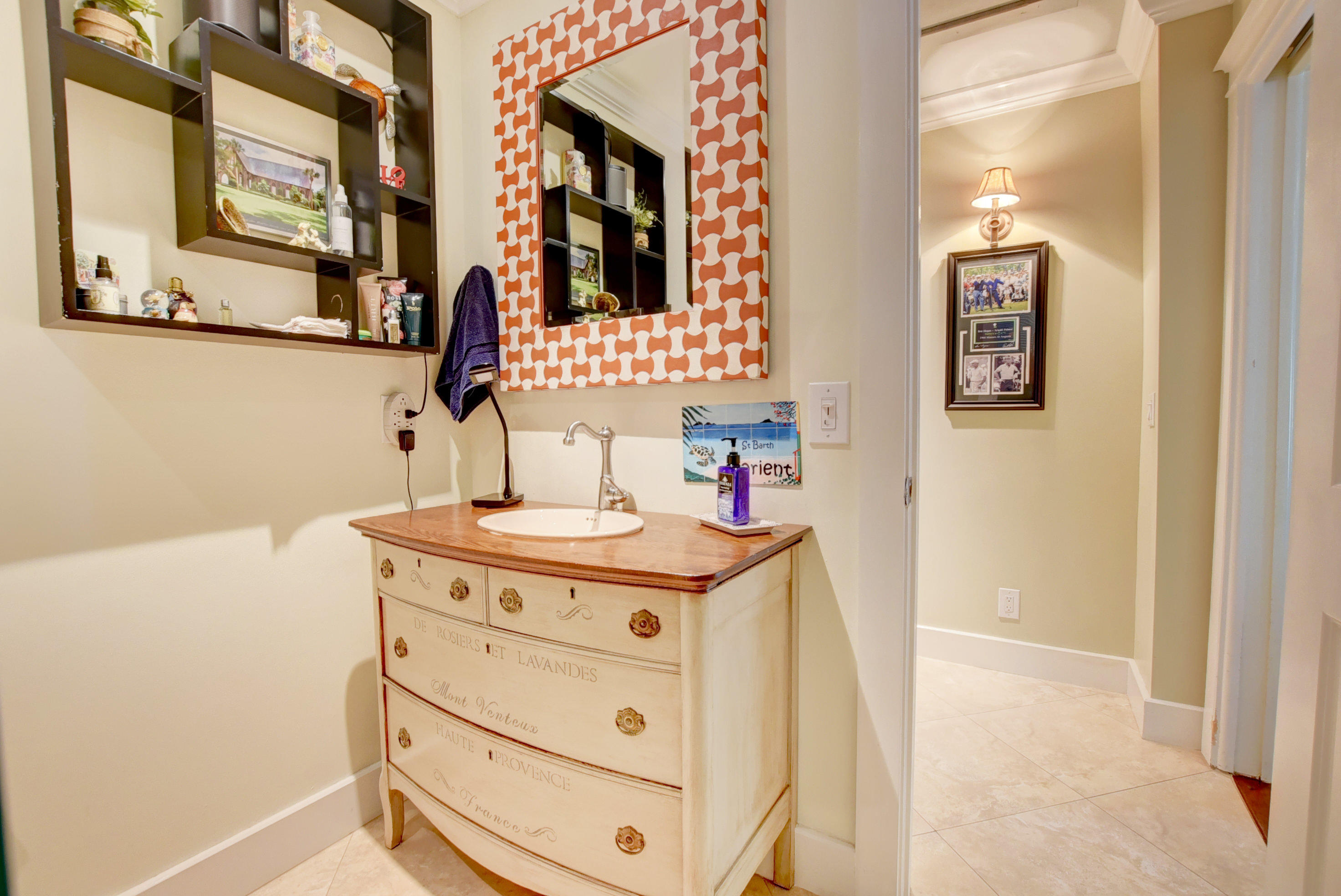 375 East Boca Raton Road Boca Raton, FL 33432 - Photo 26 of 43 a bathroom with a sink and a mirror