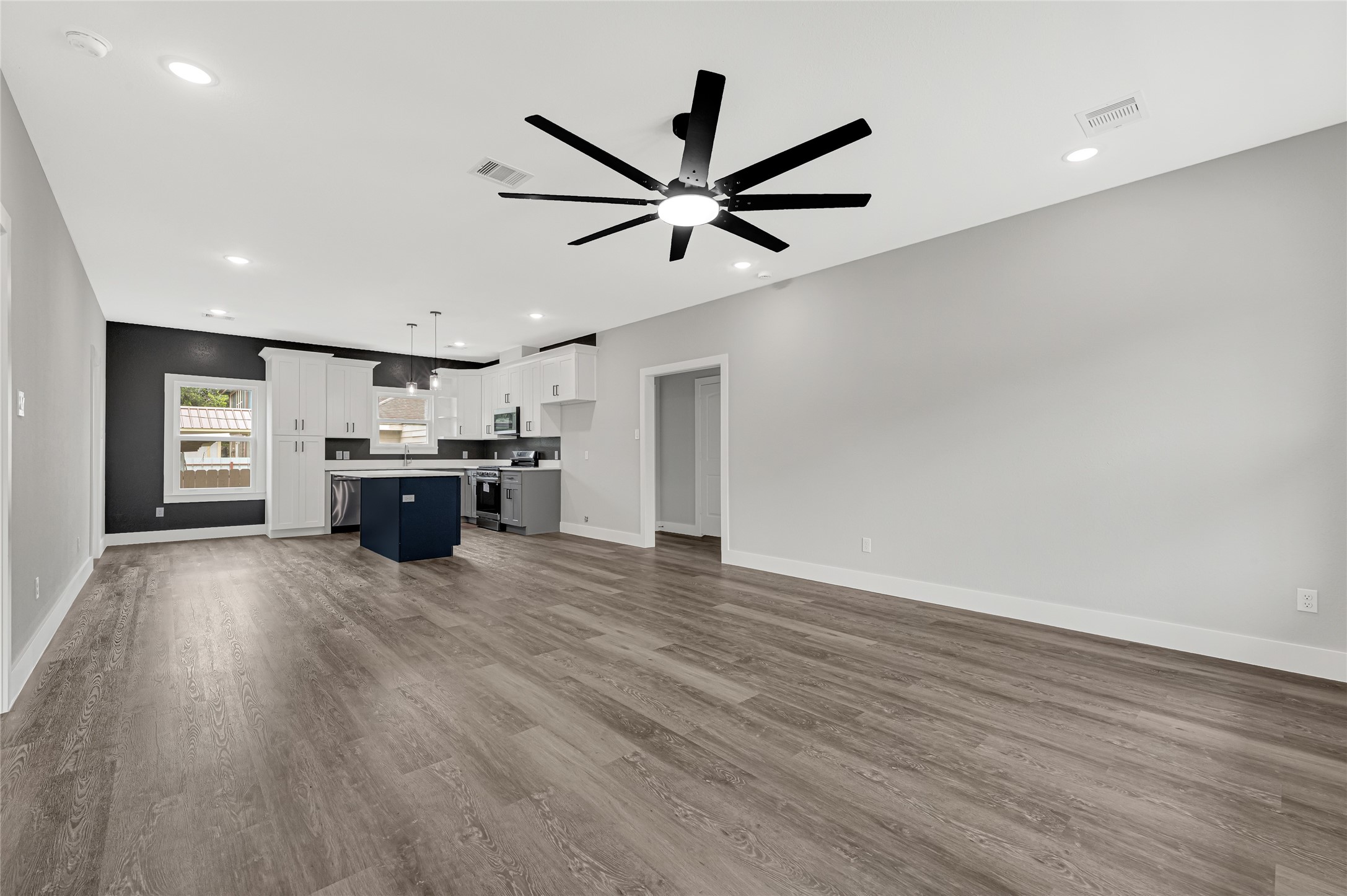 5930 Boness Road, Unit A & B Houston, TX 77396 - Photo 7 of 43 Features durable, high-quality waterproof luxury vinyl plank flooring throughout the entire home, excluding the bathrooms and laundry room.