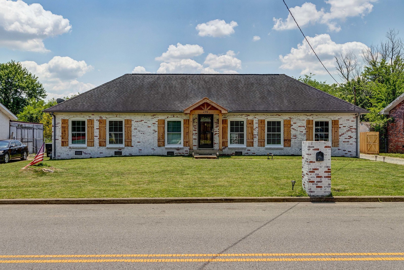 490 Rural Hill Road Nashville, TN 37217 - Photo 1 of 36 a front view of a house with a garden