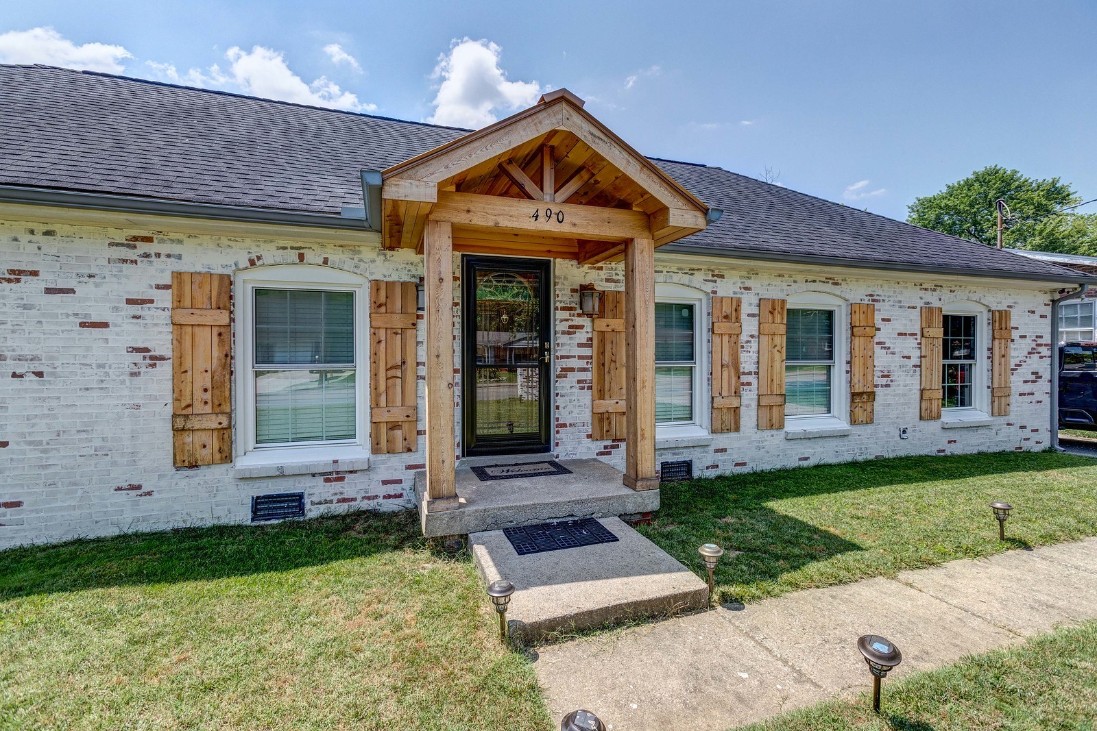 490 Rural Hill Road Nashville, TN 37217 - Photo 2 of 36 a front view of a house with garden