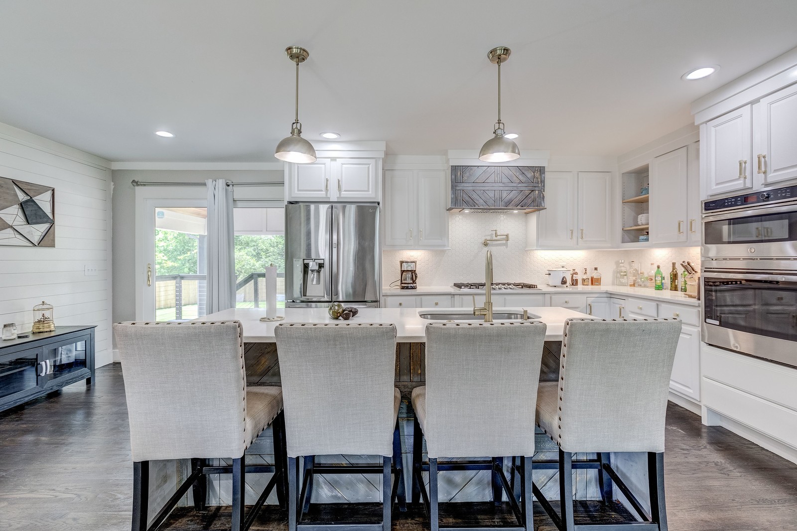 490 Rural Hill Road Nashville, TN 37217 - Photo 12 of 36 a dining room with stainless steel appliances granite countertop a dining table chairs a window and kitchen view